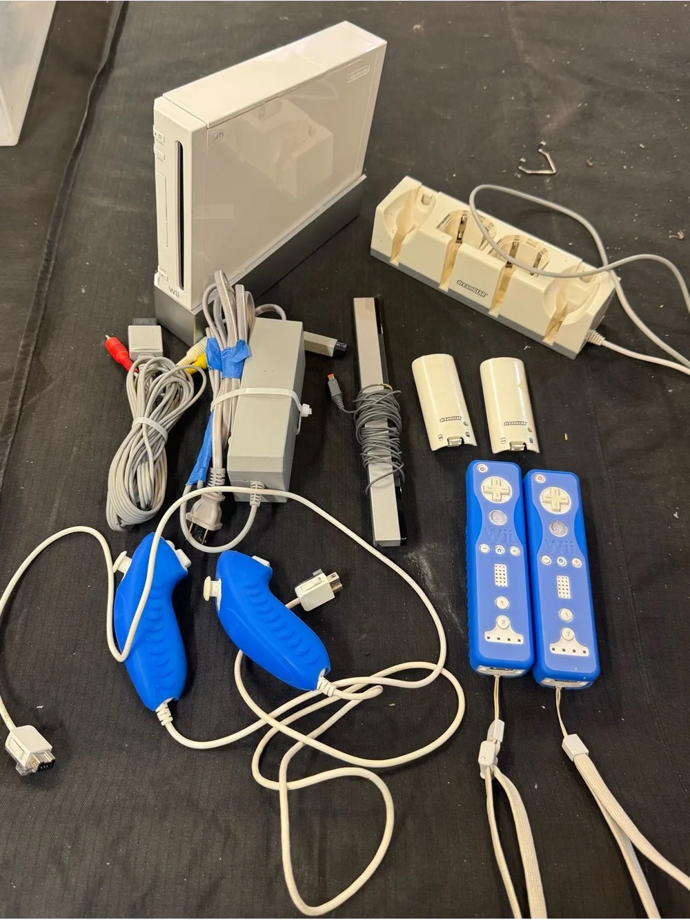 Nintendo White Wii Console with Blue Remotes and Blue Nunchuks